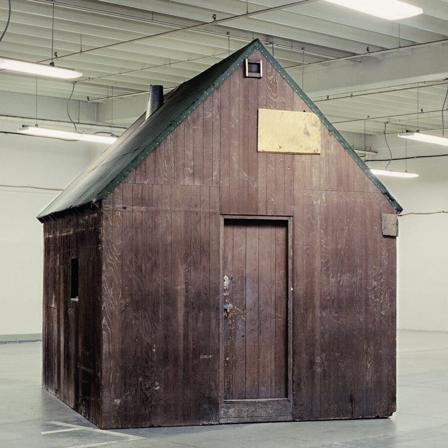 Unibomber cabin in fluorescent lighting