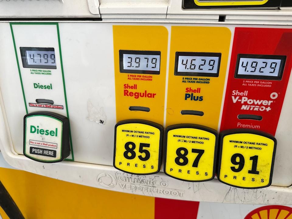 The per-gallon price is displayed electronically above the various grades of gasoline available at a Shell station Saturday, April 25, 2026, in Littleton, Colo. (AP Photo/David Zalubowski)