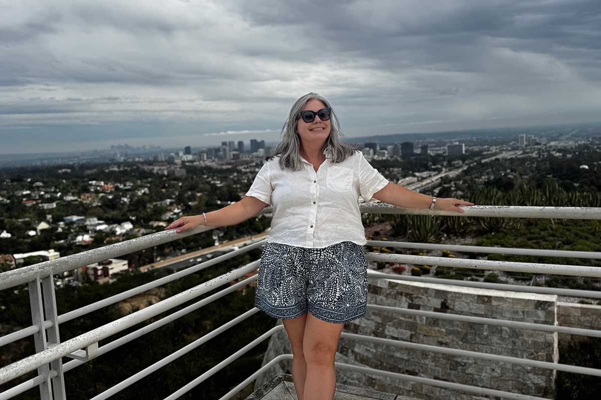 KK posing in front of the LA skyline