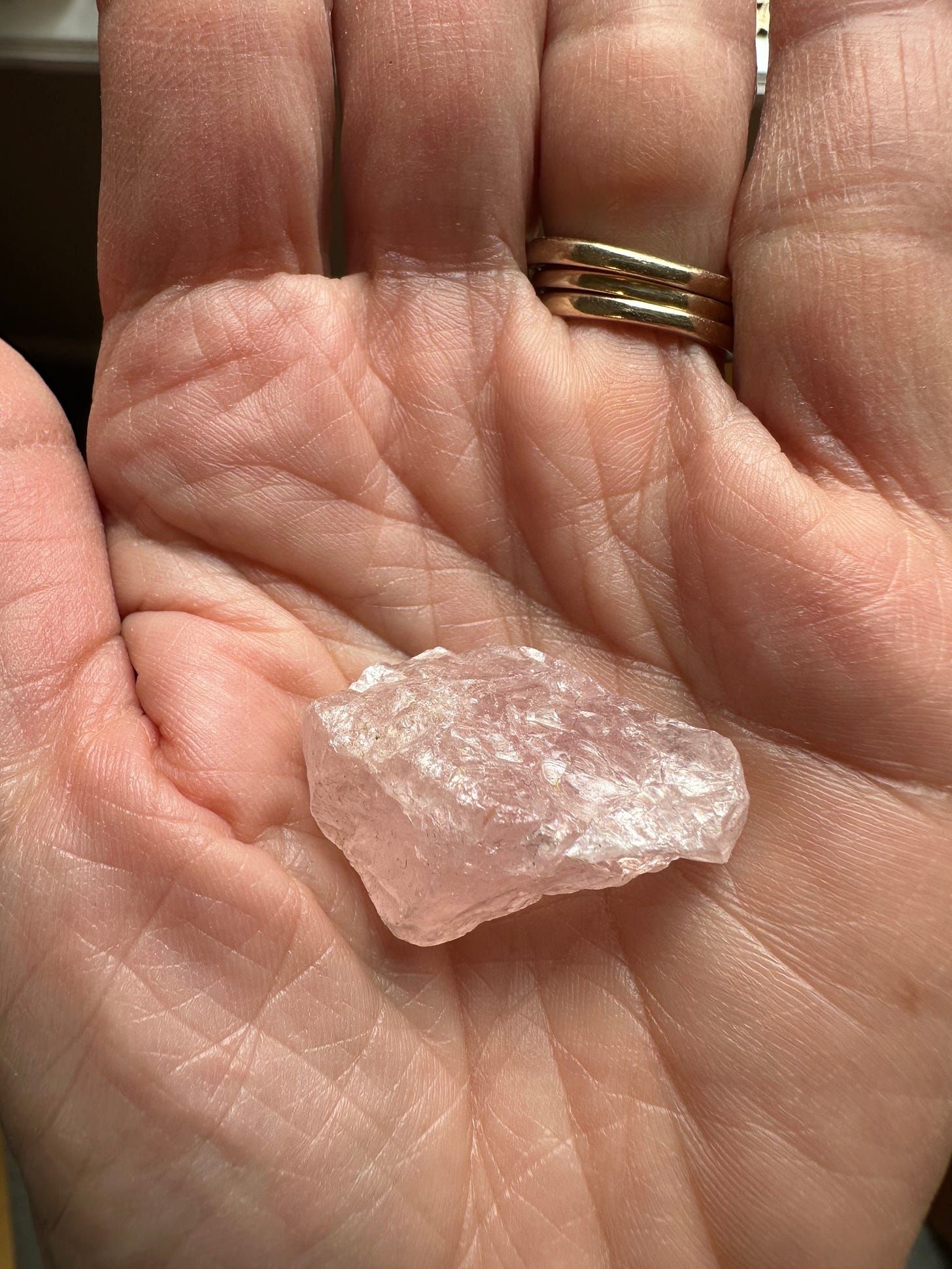 rose quartz in hand