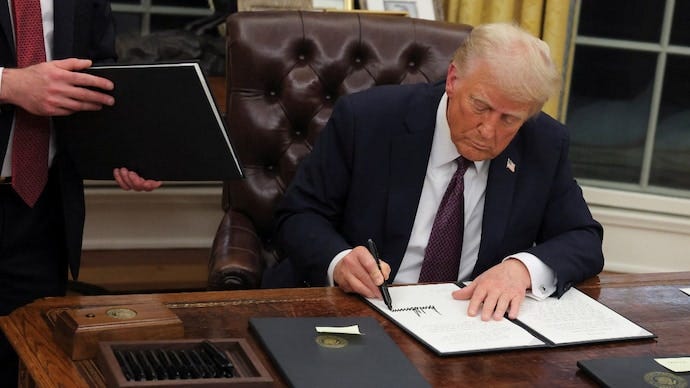 Trump signs executive order to make Elon Musk's DOGE commission an official  government service - India Today