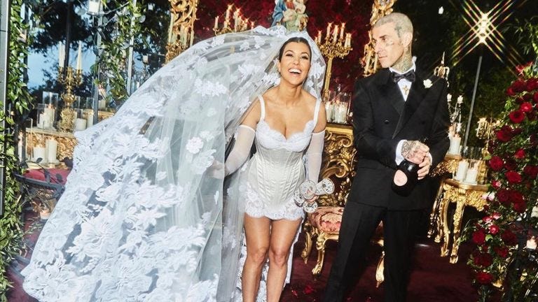 Kourtney Kardashian wedding photos released after Travis Barker nuptials in  Italy | Ents & Arts News | Sky News