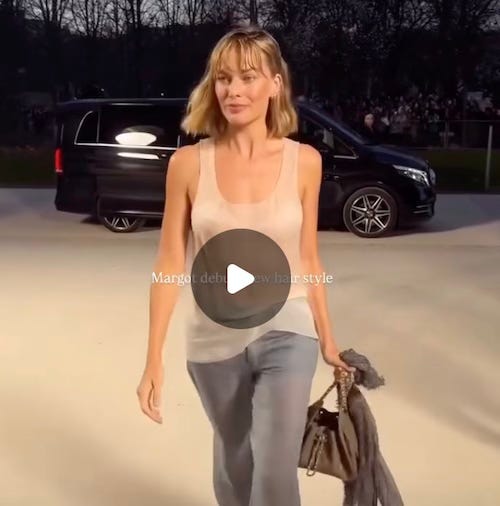 margot Robbie with a shaggy bob, looking like Margot Robbie with a shaggy bob