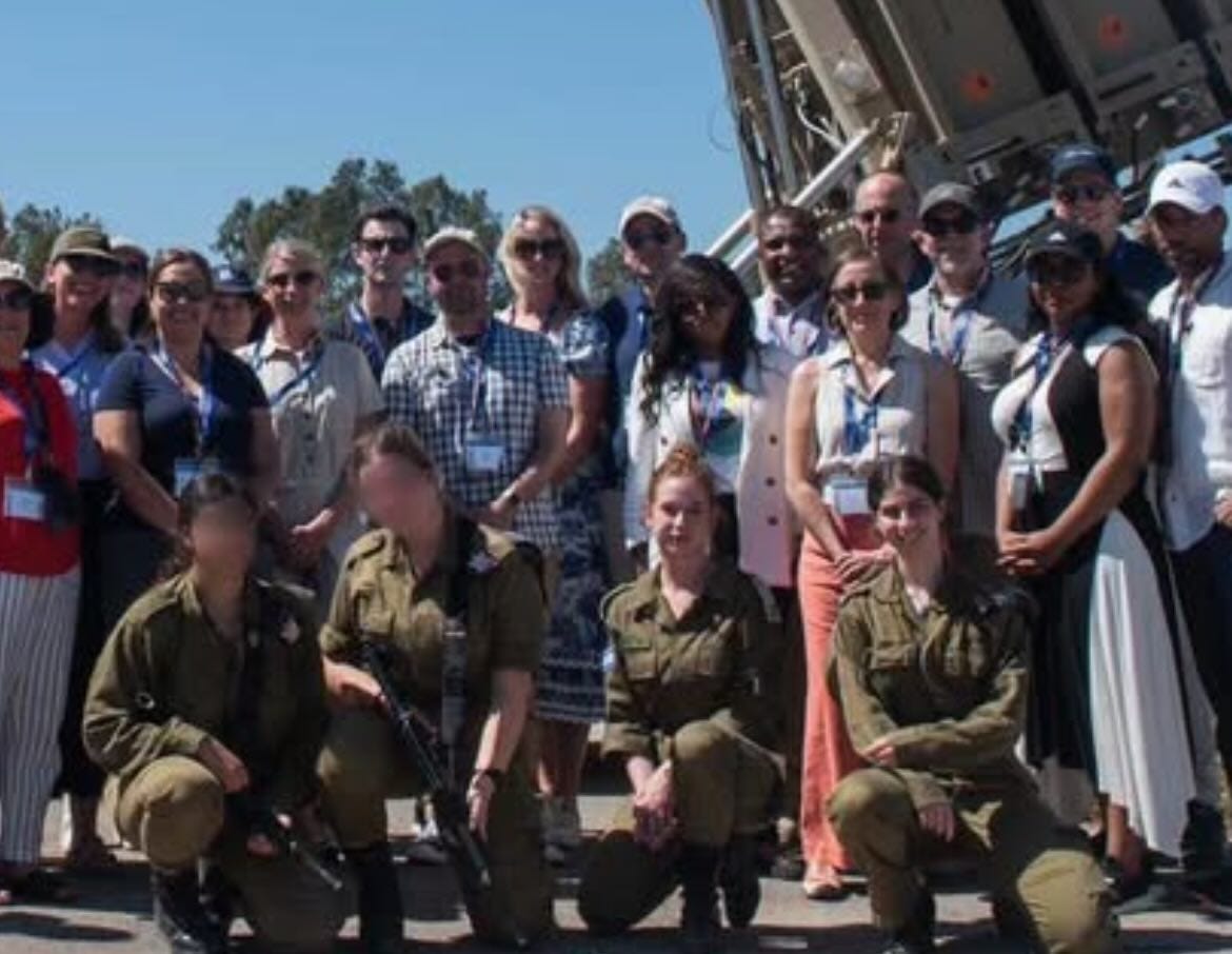 Jasmine Crockett posing with IDF soldiers.