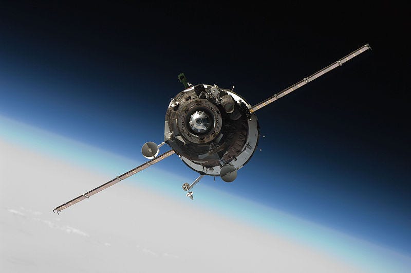 A satellite drifting in space A satellite drifting in space