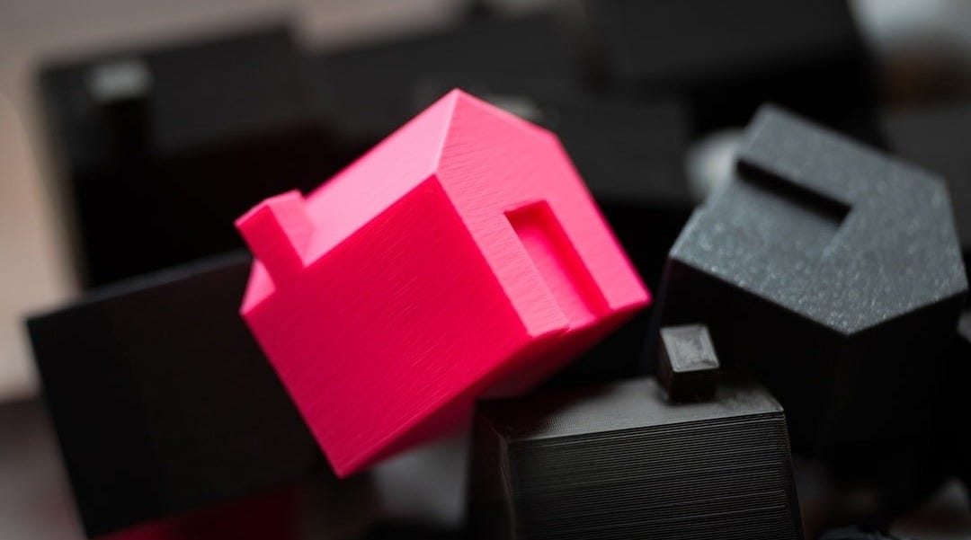 A group of black and pink objects sitting on top of a table