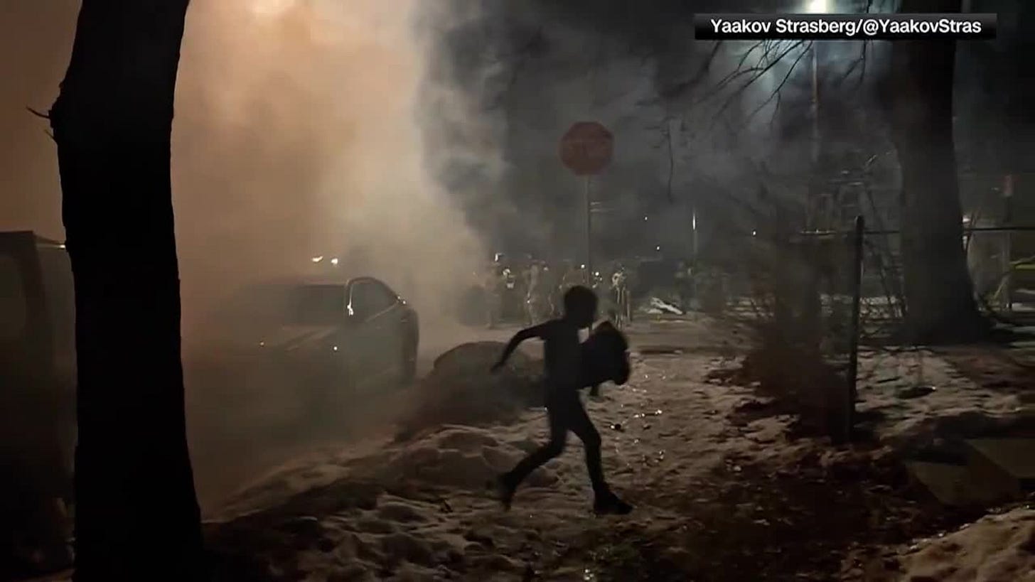 RAW: Family hit by tear gas rush kids inside during ICE protest in  Minneapolis