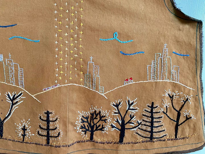 Close-ups of embroidery, including swirls, cityscapes, forests, and household objects
