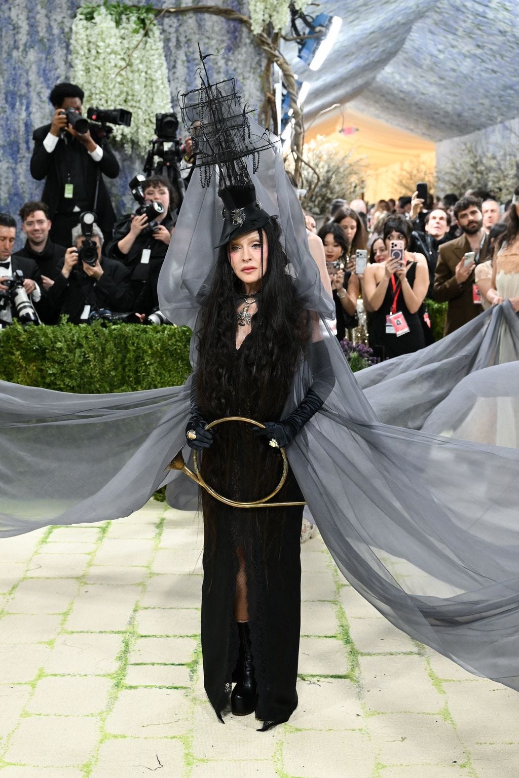 Image may contain Madonna Johanna Tukiainen Yannis Philippakis Zhang Dan Anuradha Pal Clothing Glove and Adult