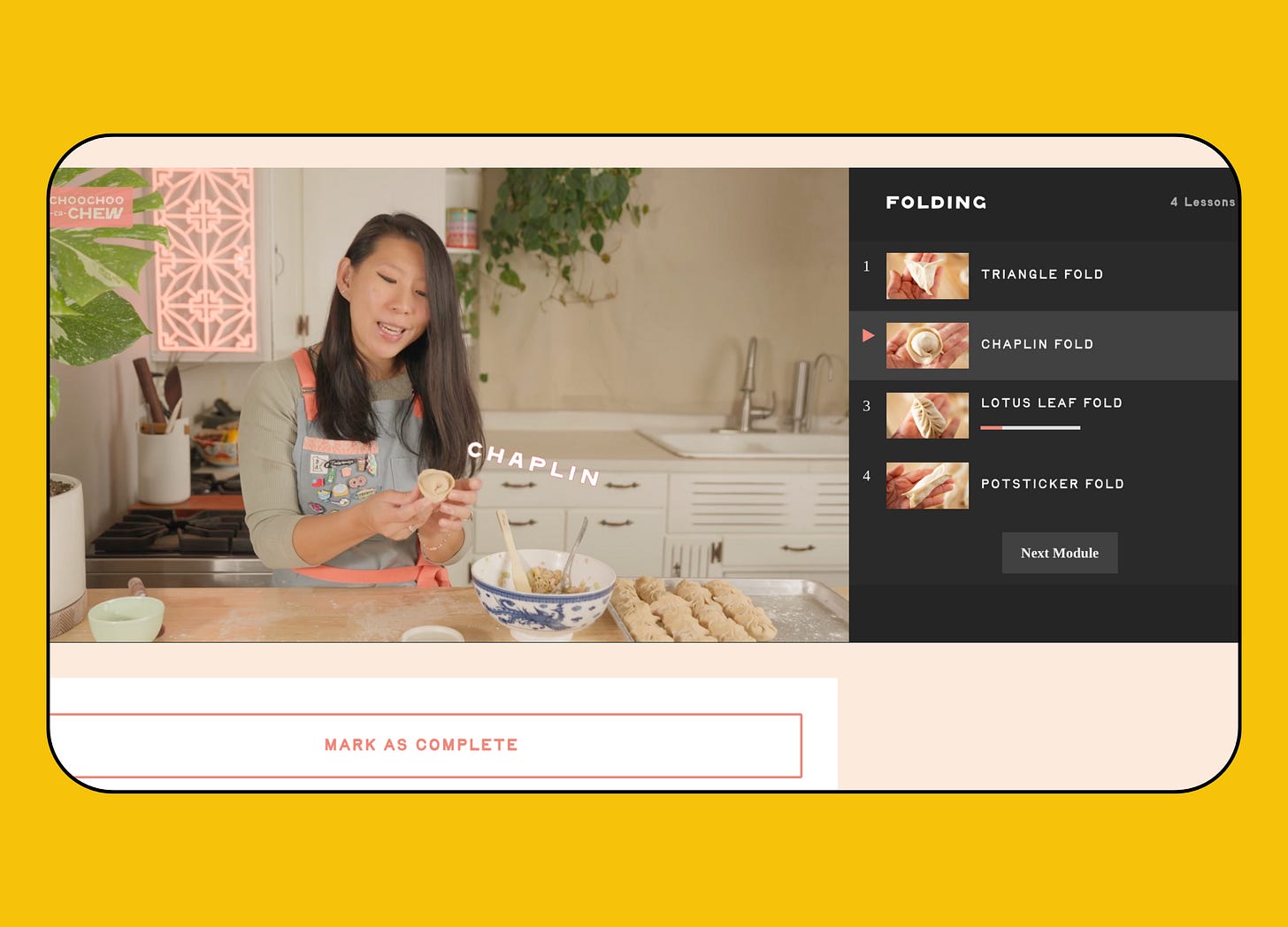 A screenshot of Tiffany demonstrating a dumpling fold in her kitchen as part of The Dumpling Club course