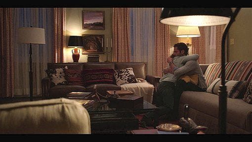 Walker Abeline giving son Cordell a hug. Walker Abeline giving son Cordell a hug.