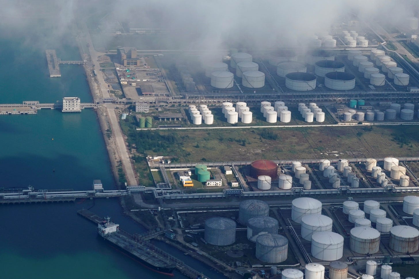 China's teapot refiners battle rising costs of imports from Russia,  Venezuela | Reuters