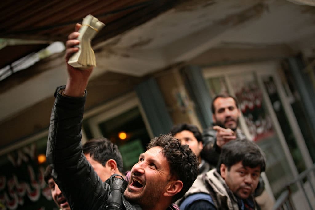 Changing money in Kabul. Afghanistan’s fragile banking system could face further challenges if trust in it is undermined.