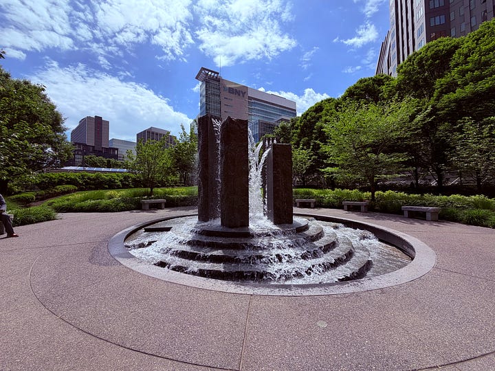 skyscraper, sky, fountain, statue, sidewalks
