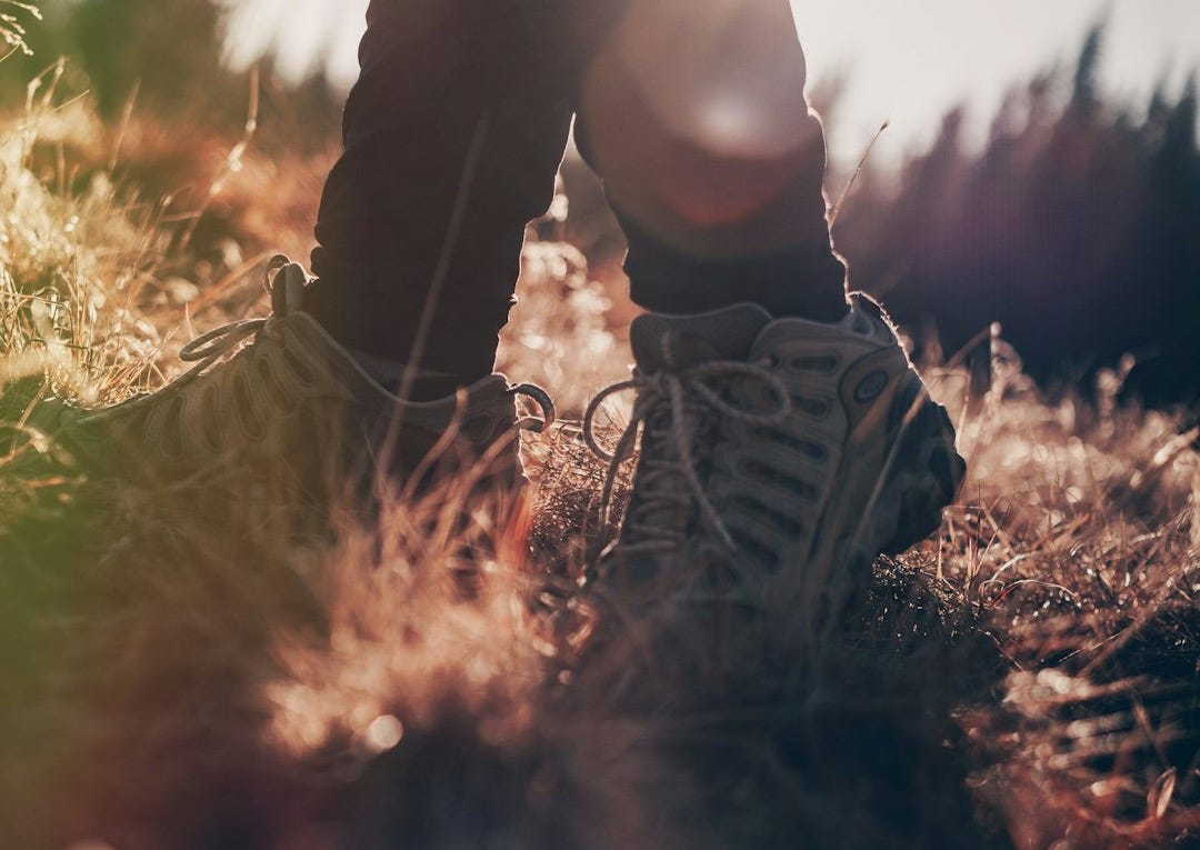 person wearing white shoes