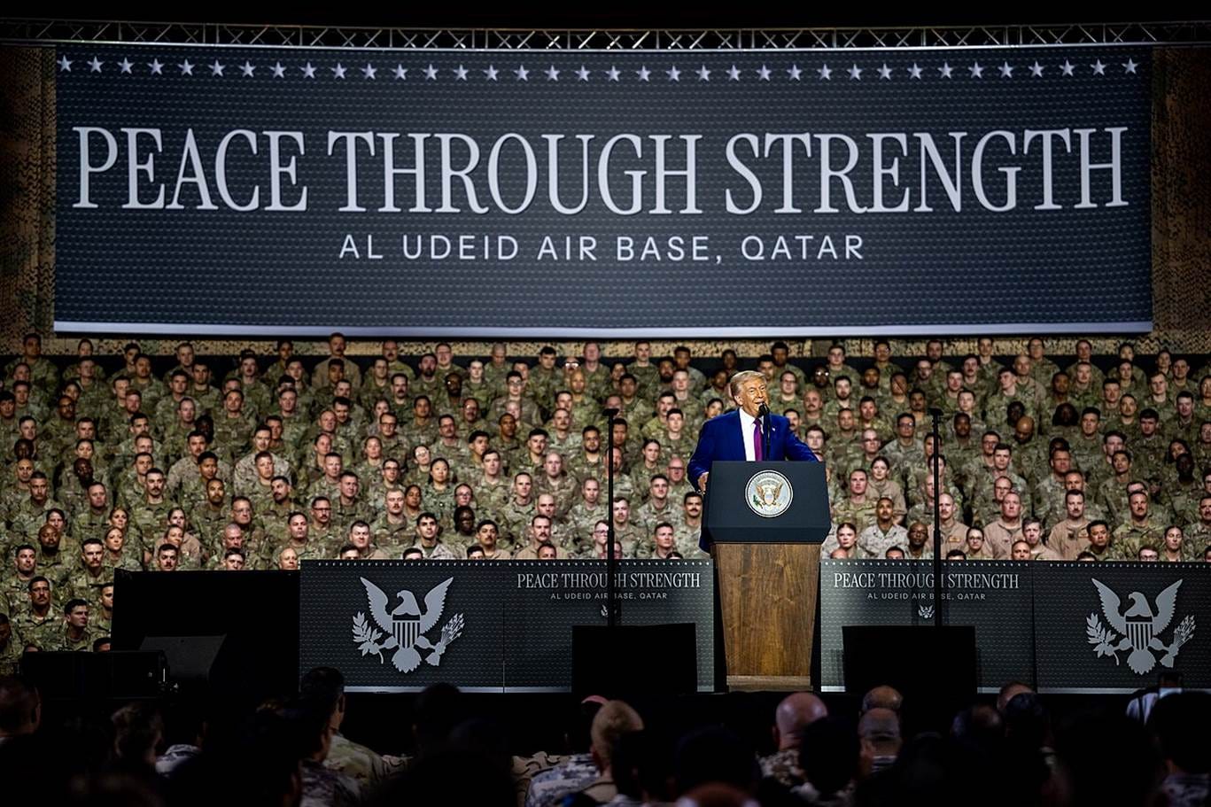 A person standing at a podium with a crowd of people in the background AI-generated content may be incorrect. A person standing at a podium with a crowd of people in the background AI-generated content may be incorrect.