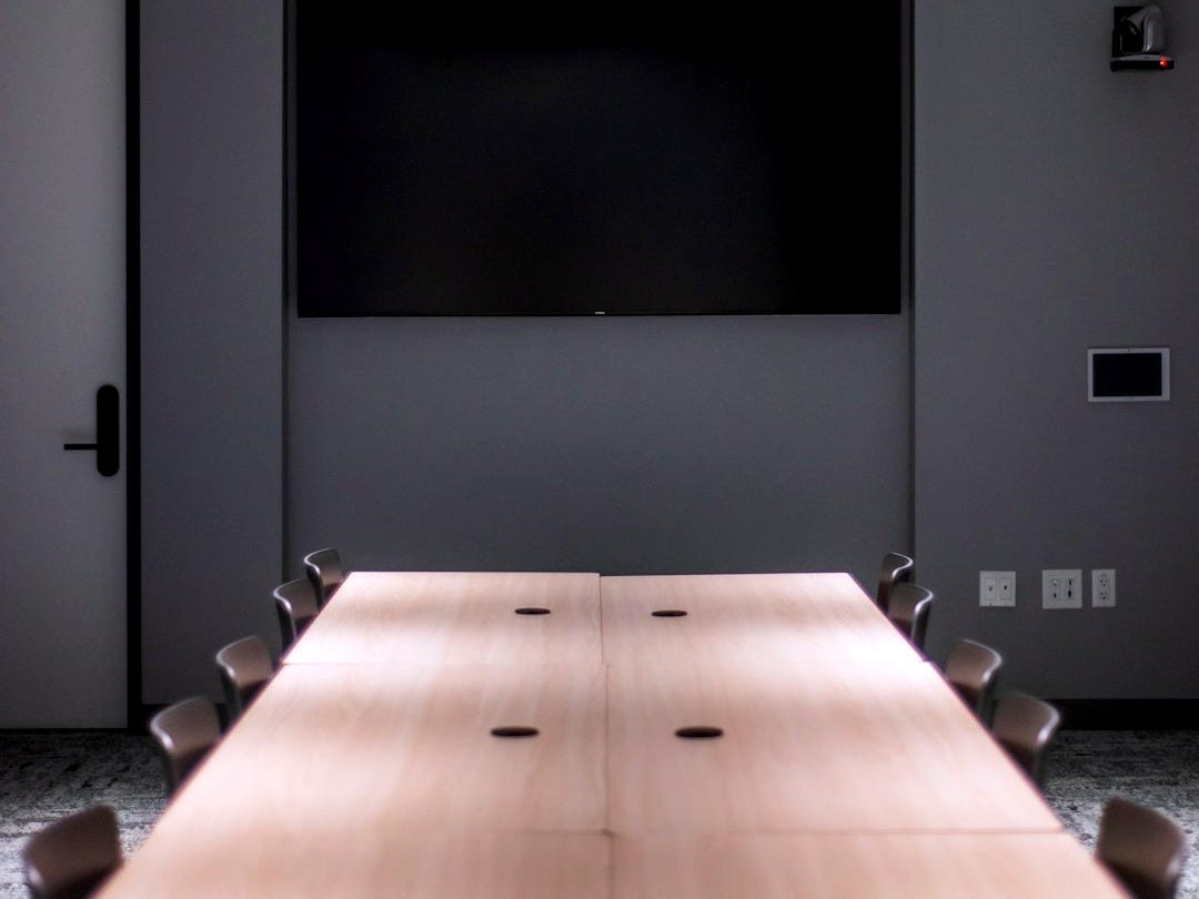 black flat screen tv on white wall