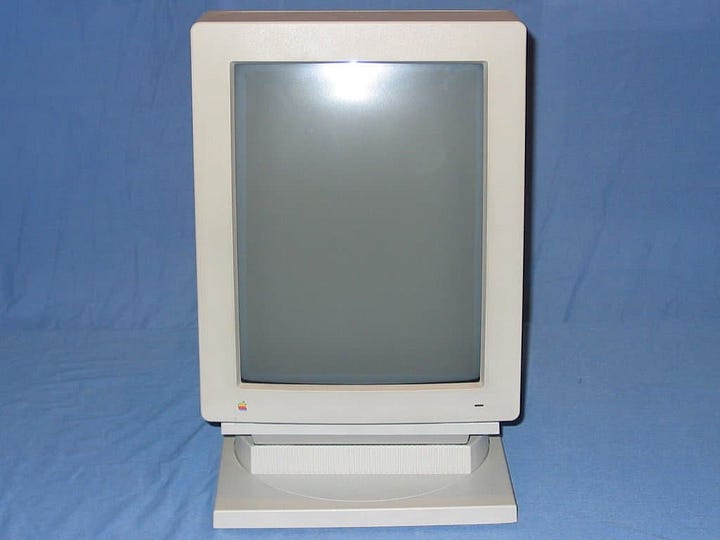 This is two image. The left-image is from a 1988 14" Apple Color Display. The right is the Apple Portrait Display.