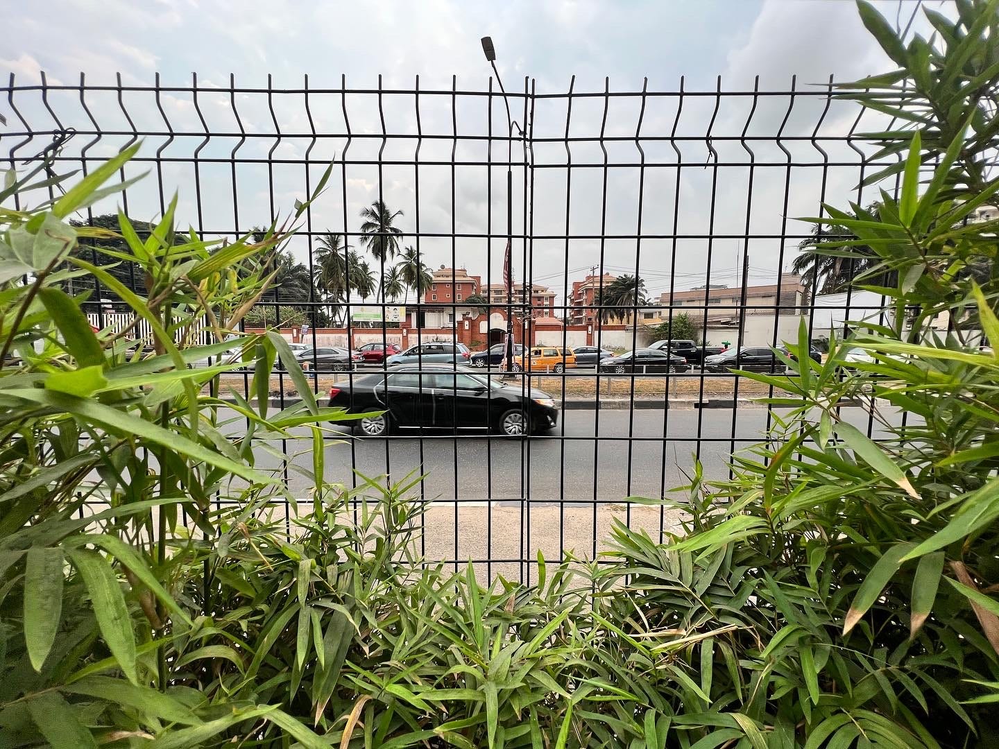A shot of a car rushing by on a busy road in Ikoyi, Lagos