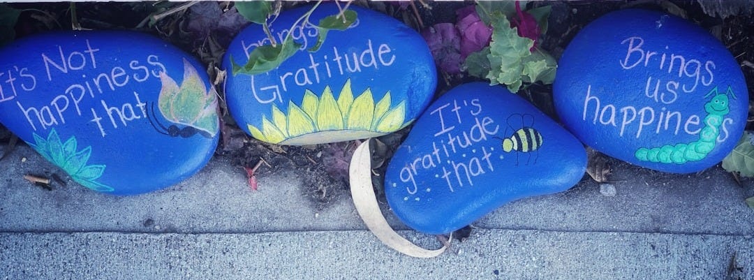 three painted rocks with words written on them three painted rocks with words written on them