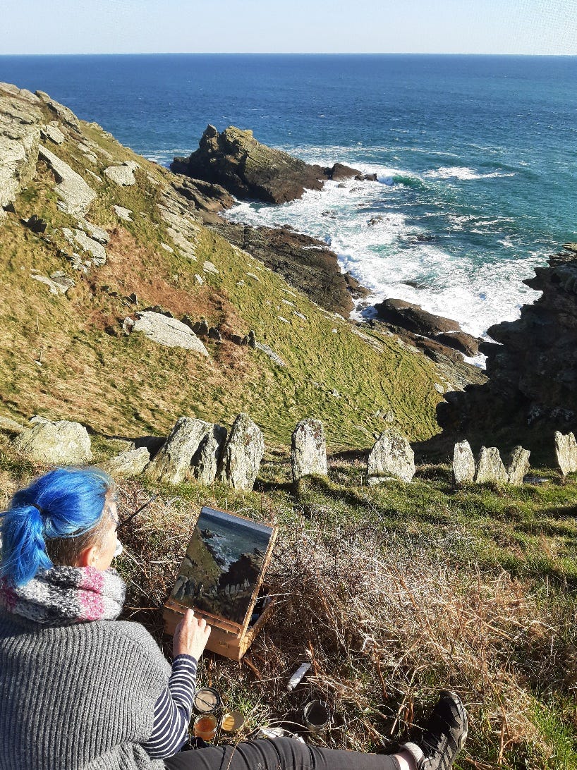 Looking over my shoulder, as I sit painting the coast