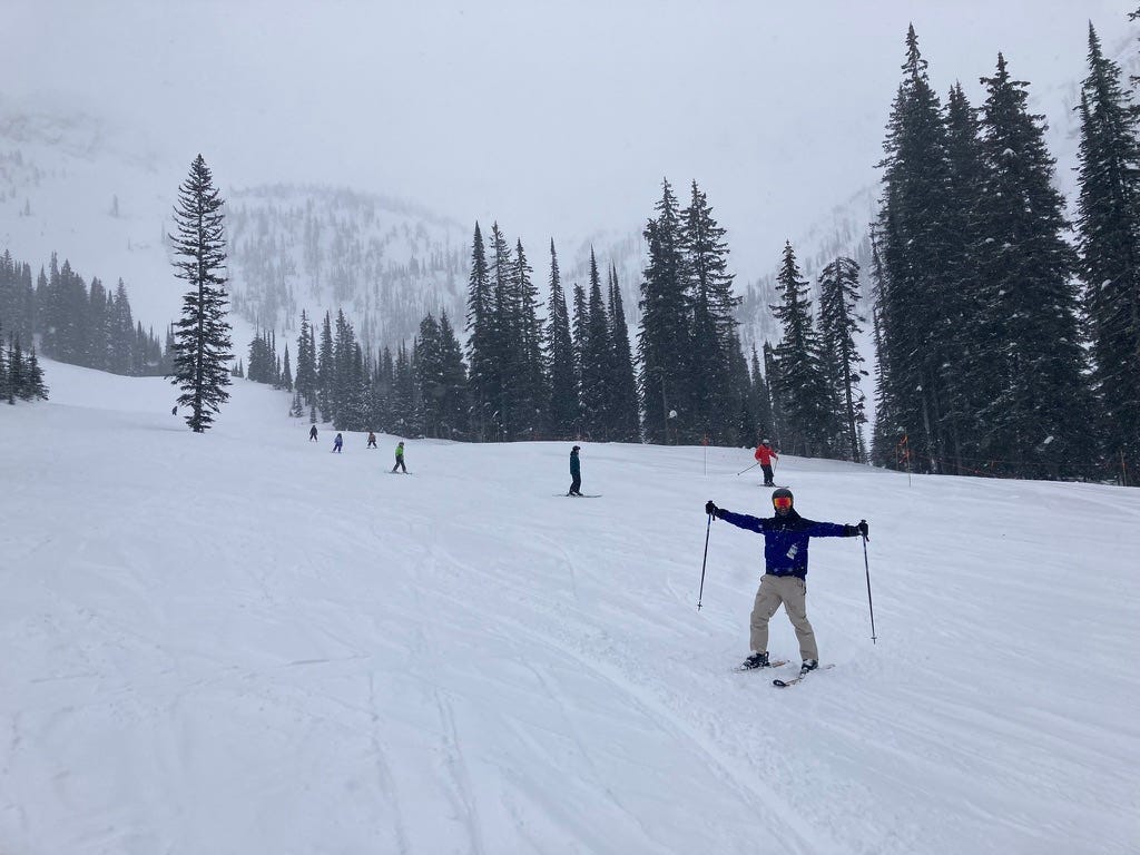A group of people skiing down a mountain

Description automatically generated with low confidence