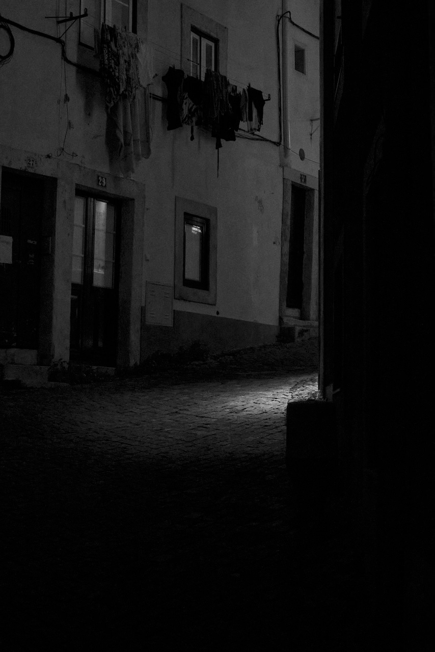 black and white view of Alfama, Lisboa, at night.