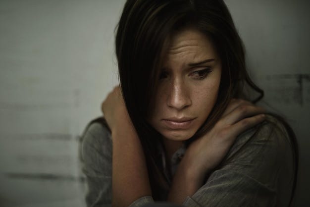 Lost and alone A young woman looking anxious and fearful | Premium Photo