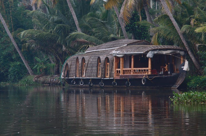 Dark pink waterlilies and three photos showing thatched houseboats with reflections