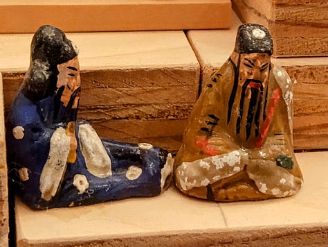 outdoor sculpture and photos of figurines from many peoples