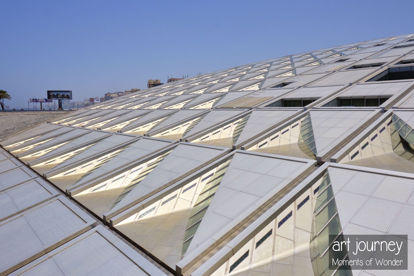 The Bibliotheca Alexandrina, spiritual successor to the Great Library, seen from outside The Bibliotheca Alexandrina, spiritual successor to the Great Library, seen from outside