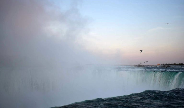 Photo of Niagara Falls at sunset. Photo of Niagara Falls at sunset.