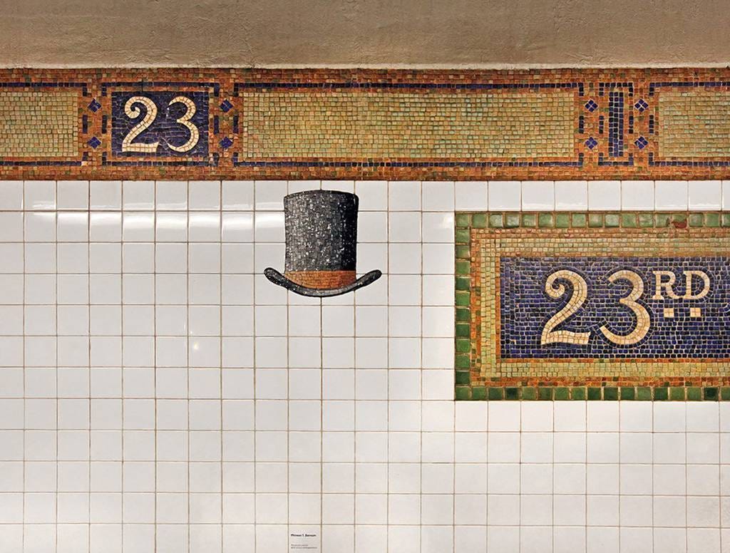 Carnival tycoon P.T. Barnum’s tall top hat is one of 60 on each side of the platform.