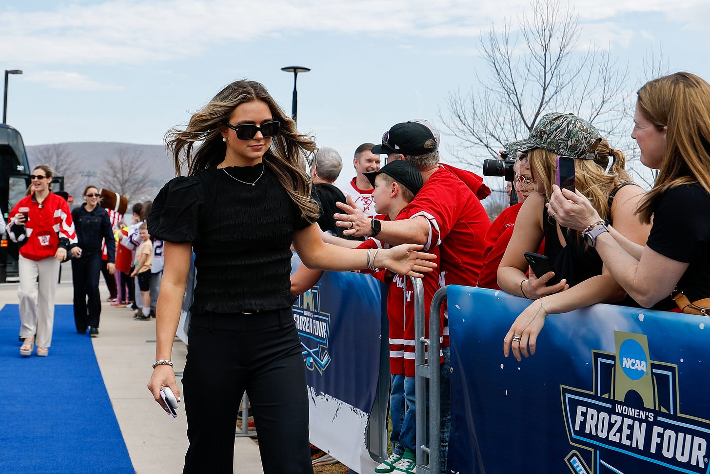 Wisconsin Badgers forward Hannah Halverson in an all black outfit and dark sunglasses