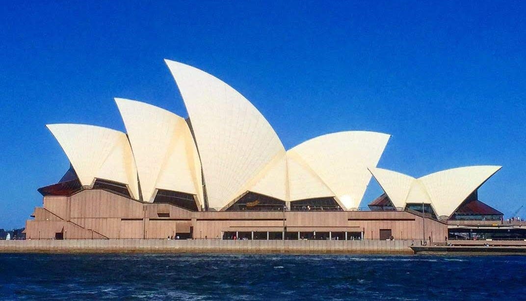 Image of Sydney Opera House with a clear blue sky