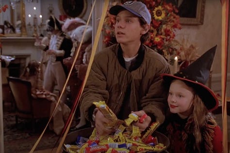 In Hocus Pocus (1993), Max and Dani trick or treat at Alison's house and drink cider against a backdrop of a Halloween costume party and candy