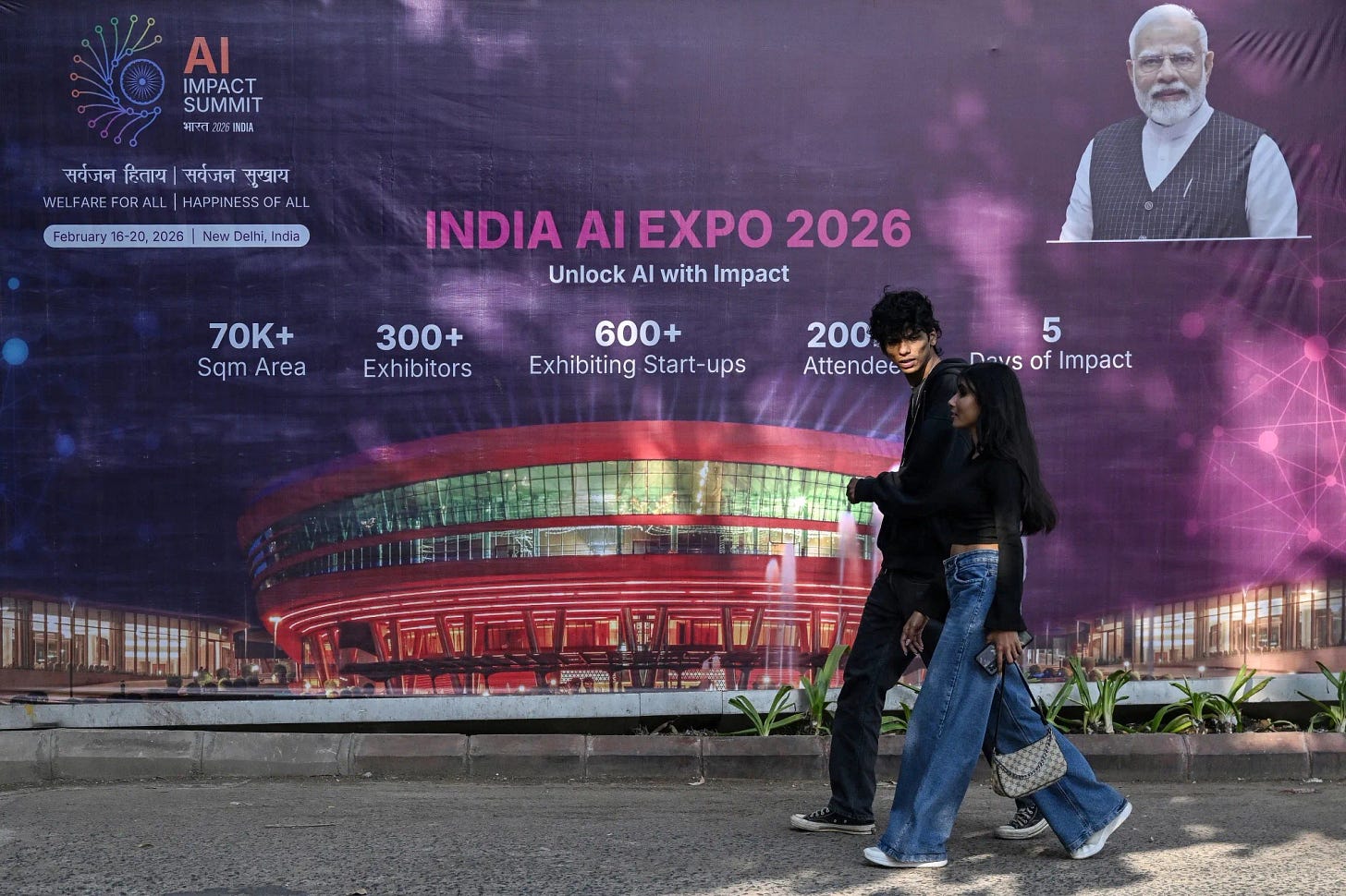 A hoarding for the 'India AI Impact Summit 2026' in New Delhi.