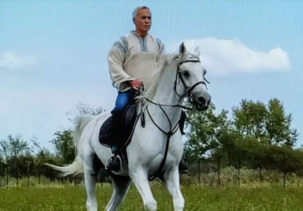 Georgescu on a white horse
