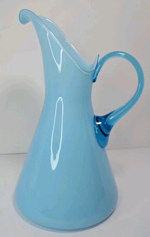 Sky blue glass pitcher.