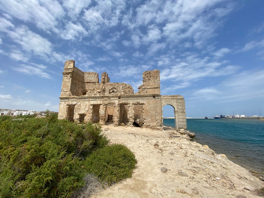 A ruined building sits on the edge of the Red Sea in Sudan.