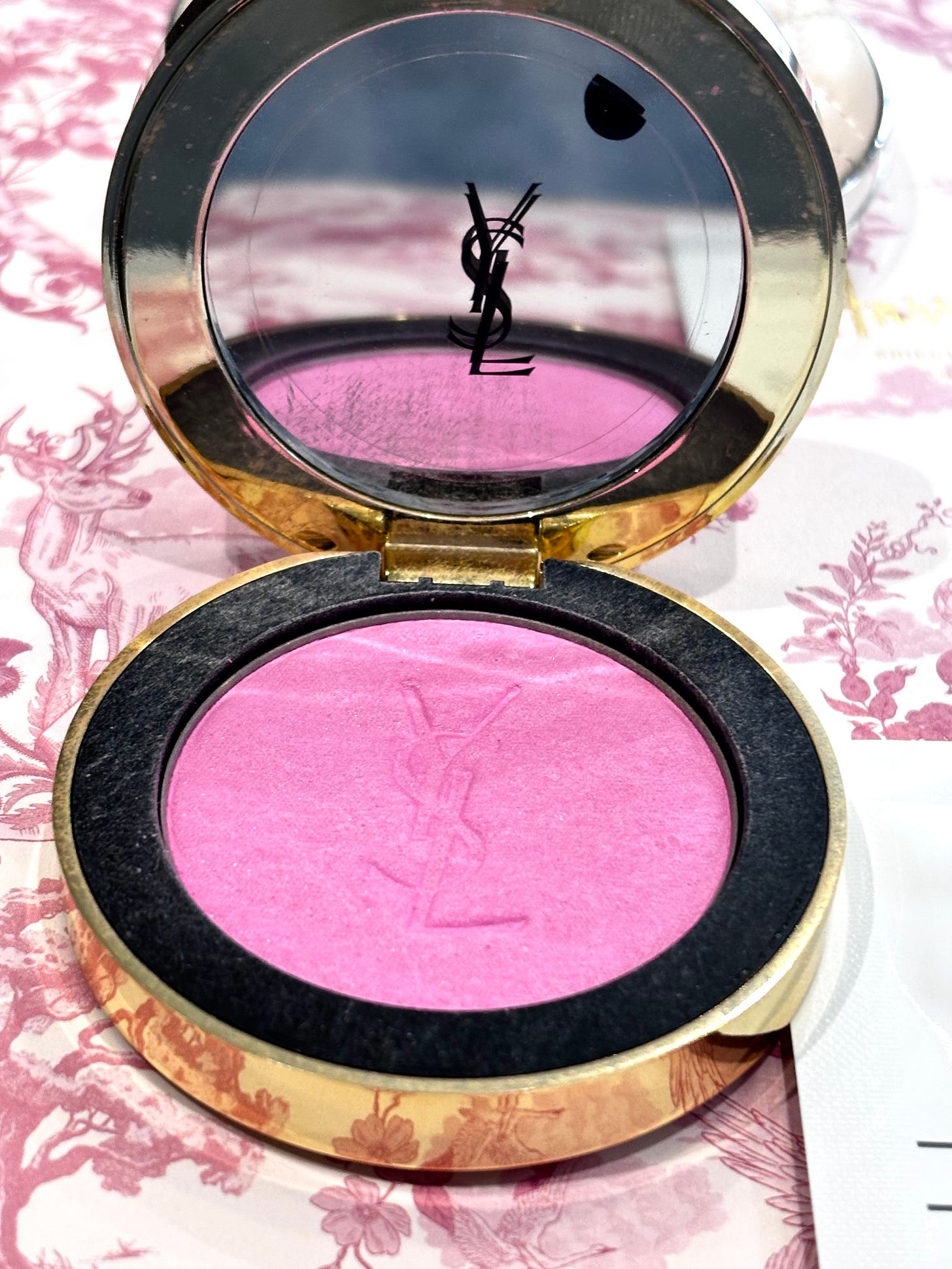 YSL Make Me Blush Powder on a pink background