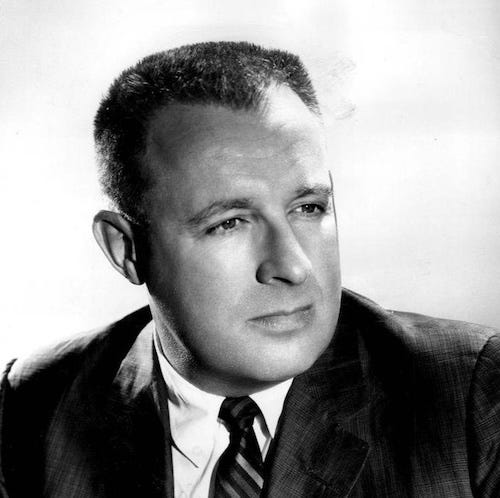 Black-and-white photograph of author Ray Bradbury, who wrote the short story "A Sound of Thunder."