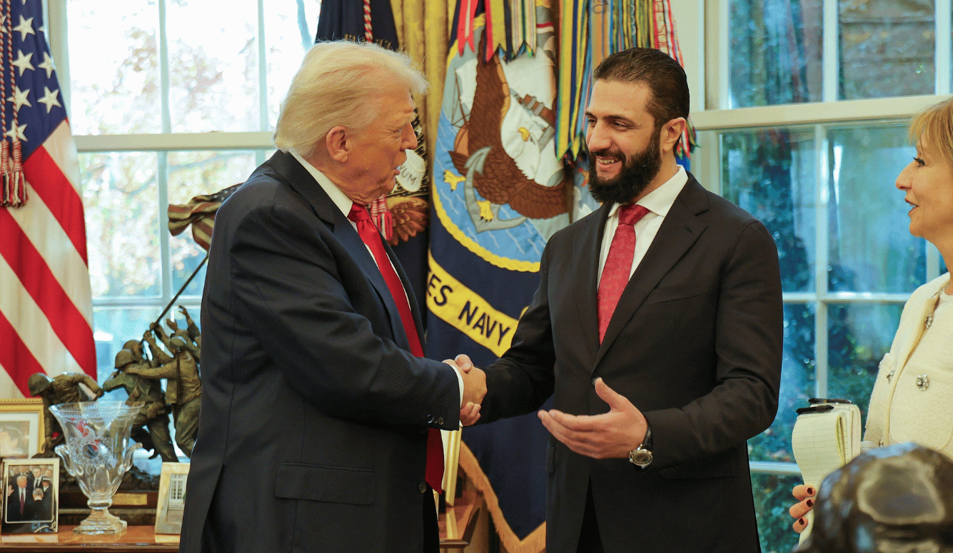 US President Donald Trump (left) receives Syrian President Ahmad al Sharaa at the White House, in Washington
