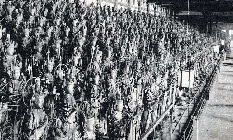 The image depicts a large assembly line with numerous identical robotic figures arranged in rows, suggesting a highly organized and mechanized production process.

AI-generated content may be incorrect.