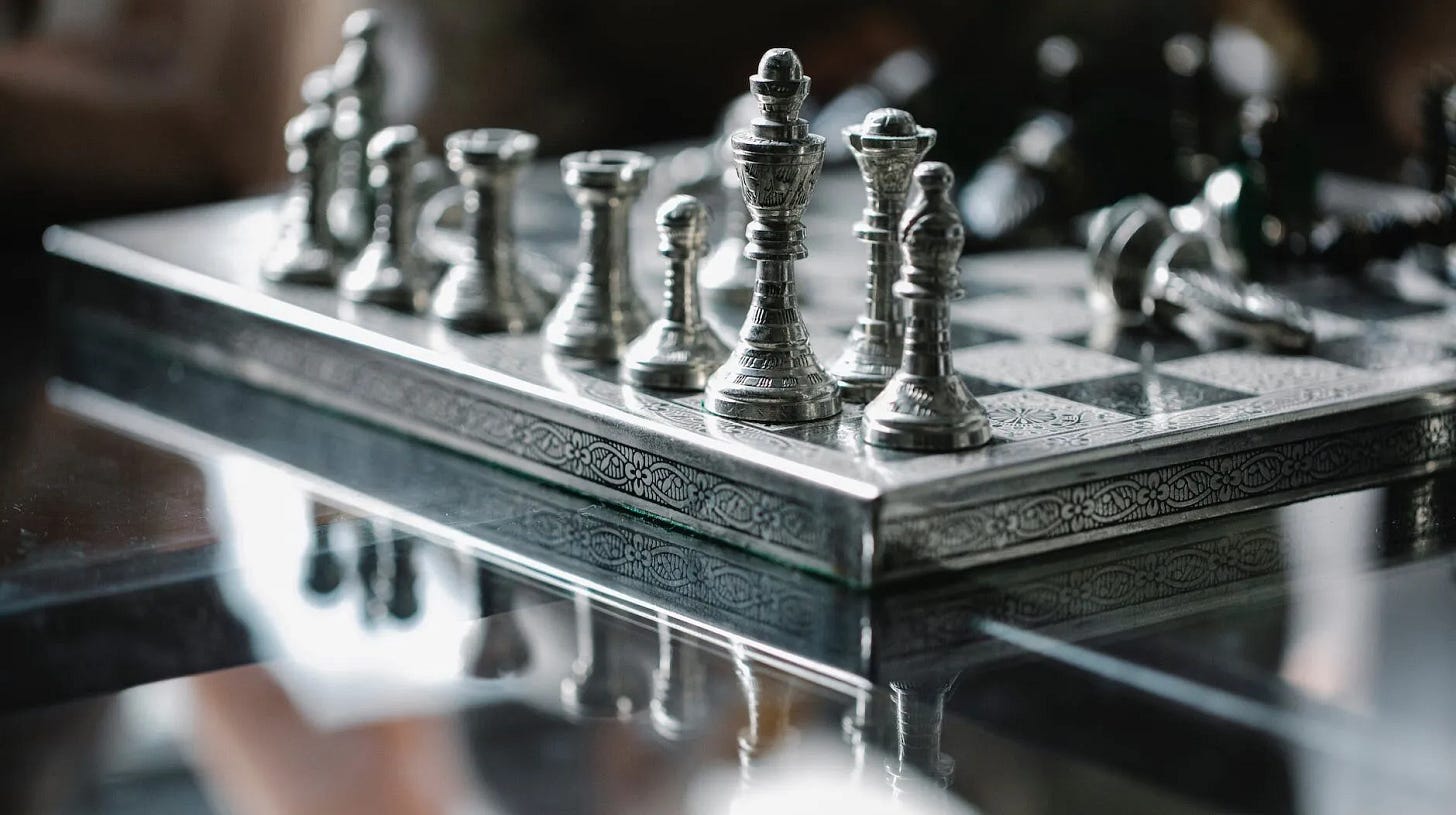 metal carved chess board with set pieces metal carved chess board with set pieces