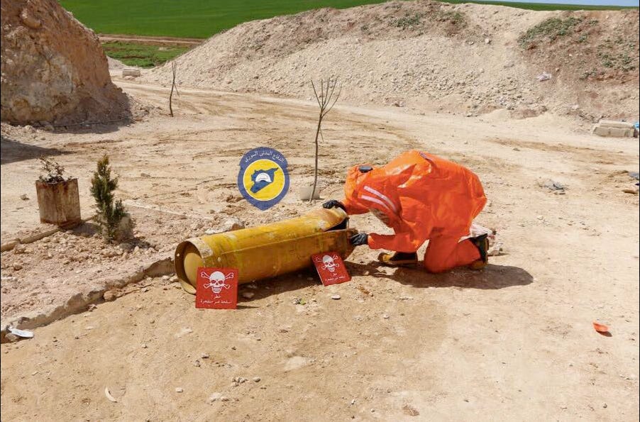 A person in a protective suit

AI-generated content may be incorrect.