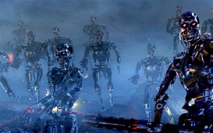 Screenshot from Terminator movie showing an army of killer robots with glowing read eyes