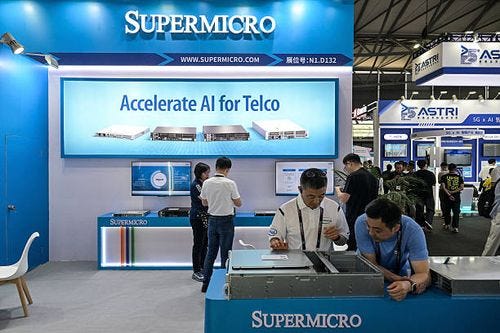 People visit the Supermicro stand during the Mobile World Congress at the Shanghai New International Expo Centre in Shanghai on June 18, 2025. People visit the Supermicro stand during the Mobile World Congress at the Shanghai New International Expo Centre in Shanghai on June 18, 2025.