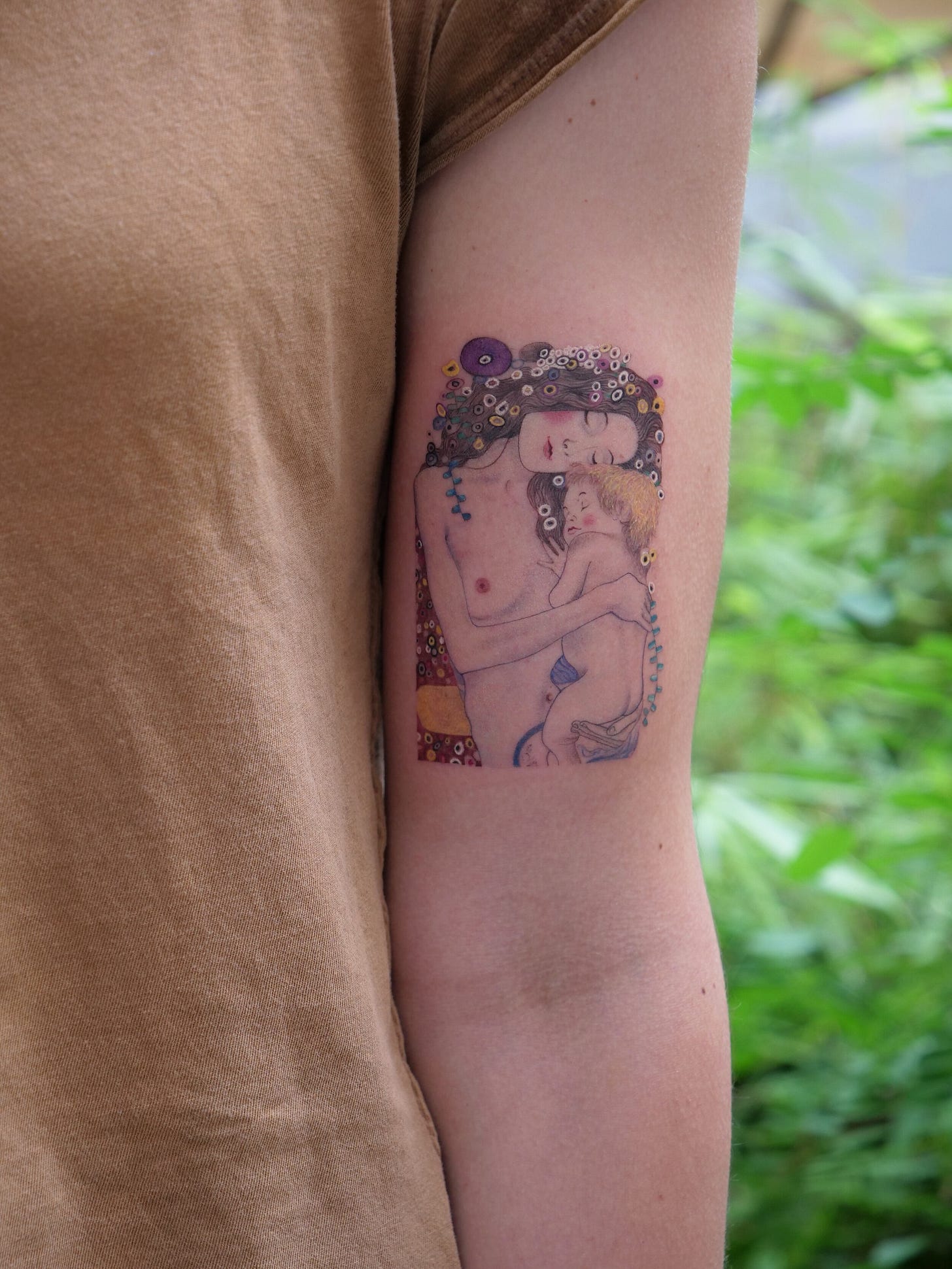 a person's arm with a tattoo on it