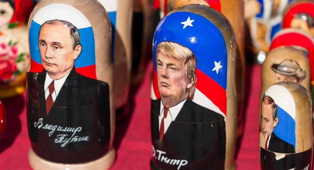 Donald Trump nesting dolls on red textile Donald Trump nesting dolls on red textile